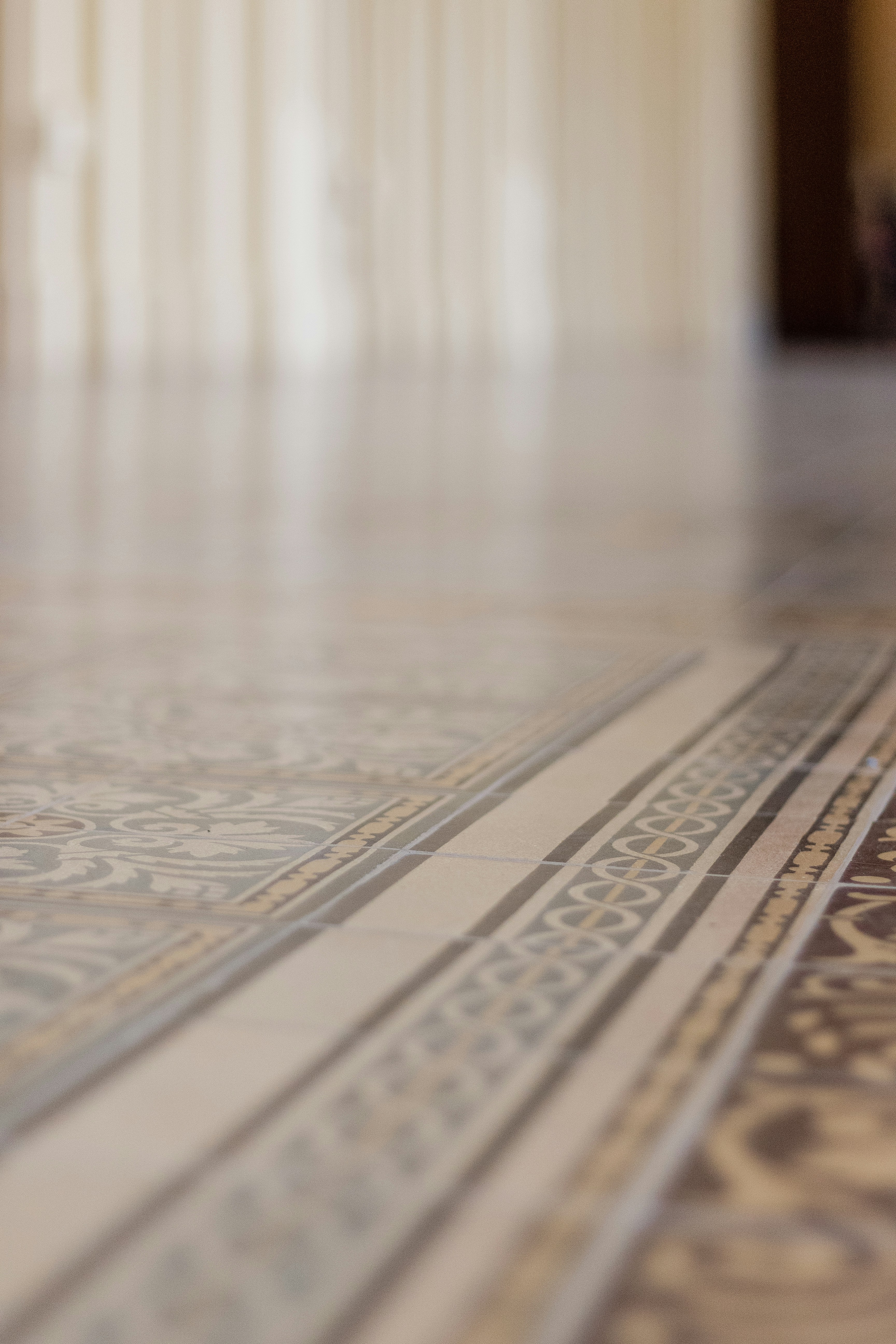 Ornate patterned marble floor border